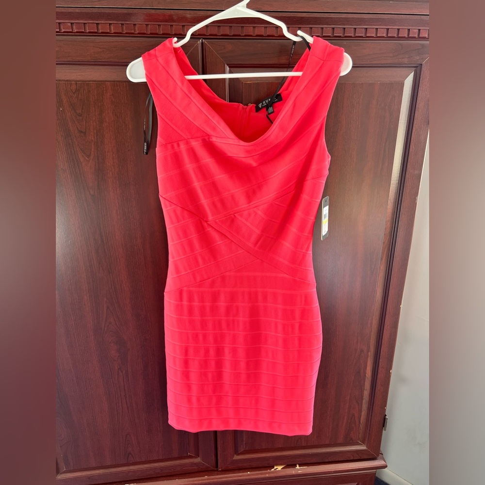 Guess Los Angelos pink textured mini dress. Very flattering. Not bodycon.